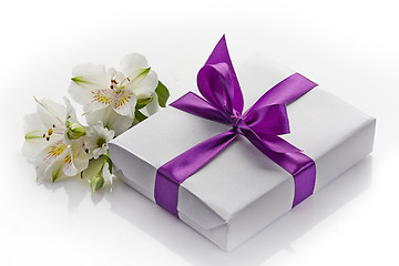 Image showing gift box and flowers