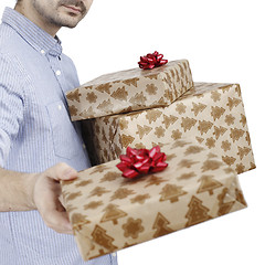 Image showing Young man holding a present