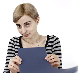 Image showing Woman holding a paper