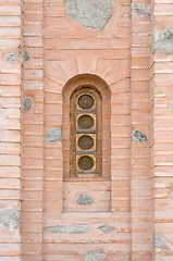 Image showing Old window on a brick wall.