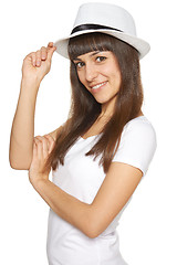 Image showing Stylish casual young woman posing with a hat