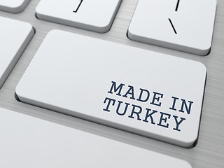 Image showing Made in Turkey on Button of White Keyboard.