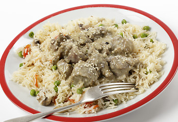 Image showing Lamb korma with veg pilau