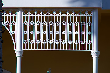 Image showing ornate white wrought iron gate