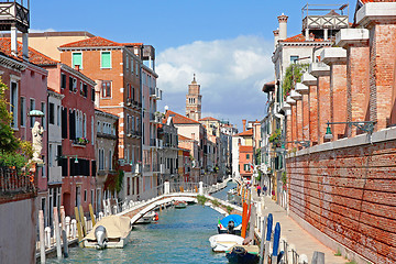 Image showing Italy. Venice. Canal with bridge among old colorful brick houses