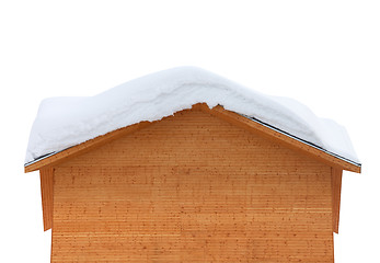 Image showing Wooden house with snow on roof