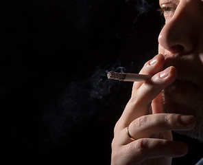 Image showing Portrait man smoking cigarette