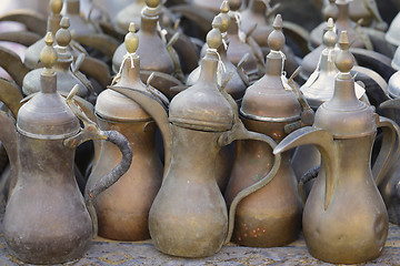 Image showing Old coffee pots in Doha souq