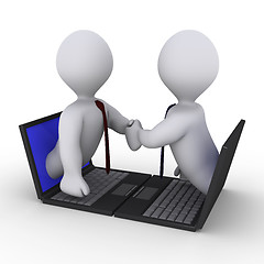 Image showing Businessmen handshake through laptop