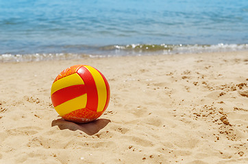 Image showing ball on sand near sea