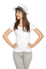 Image showing Stylish casual young woman posing with a hat