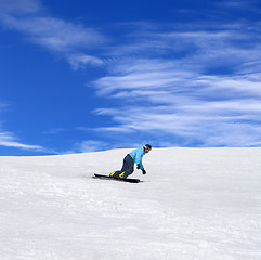 Image showing Snowboarder in winter mountains