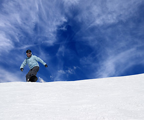 Image showing Snowboarder on off piste slope