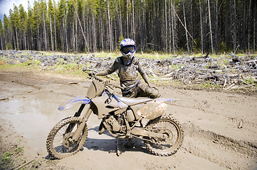 Image showing Muddy Motocross Racer