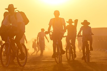 Image showing Golden sunset with many people