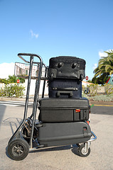 Image showing Cart an many suitcases