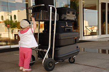 Image showing Child and suitcases