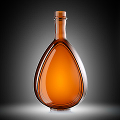 Image showing Red glass bottle for wine or brandy