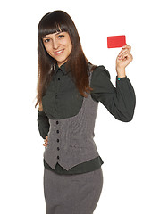 Image showing Smiling business woman holding credit card