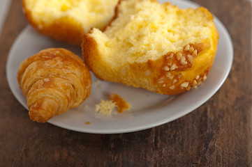 Image showing fresh baked muffin and croissant mignon