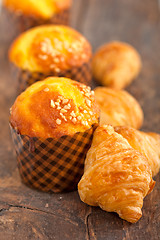 Image showing fresh baked muffin and croissant mignon