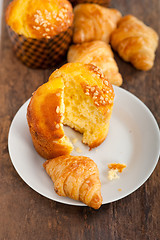 Image showing fresh baked muffin and croissant mignon