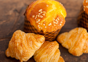 Image showing fresh baked muffin and croissant mignon