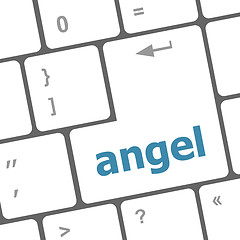Image showing Keyboard with white Enter button, angel word on it