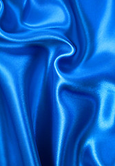 Image showing Smooth elegant blue silk as background 