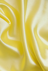 Image showing Smooth elegant golden silk as background