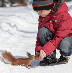 Image showing Squirrel and little boy