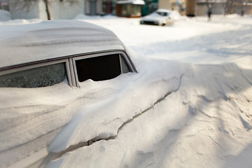 Image showing White old car covered with snow