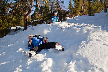 Image showing Little skiers relaxing