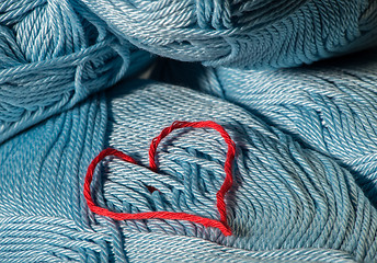 Image showing Knitted red heart on blue