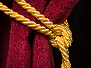 Image showing Red velvet curtain with tassel