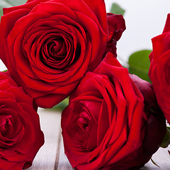 Image showing beautiful red rose flower on black background