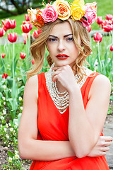 Image showing beautiful woman portrait outdoor with colorful flowers