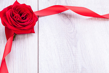 Image showing Bouquet of red roses with ribbon border