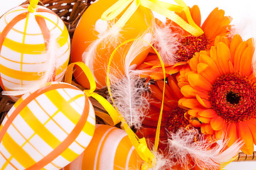 Image showing Colourful yellow decorated Easter eggs