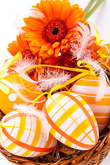 Image showing Colourful yellow decorated Easter eggs