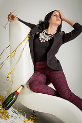 Image showing Seductive brunette holding a glass of champagne