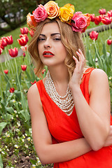 Image showing beautiful woman with roses outdoor summertime