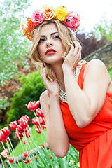 Image showing beautiful woman portrait outdoor with colorful flowers
