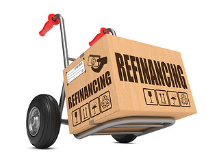 Image showing Refinancing - Cardboard Box on Hand Truck.