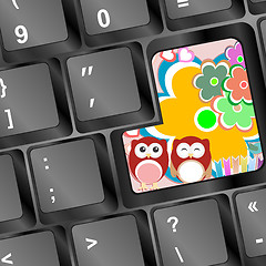 Image showing owl on computer keyboard key with flowers