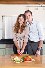 Image showing Business couple in kitchen