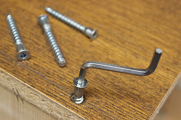 Image showing Tightening the screws when assembling furniture tool