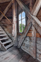 Image showing Interior of an abandoned wooden house with staircase