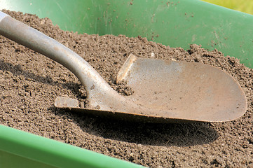 Image showing Gardening-Shovel-Sandy Soil-Wheelbarrow