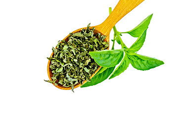Image showing Basil green fresh and dry in a spoon